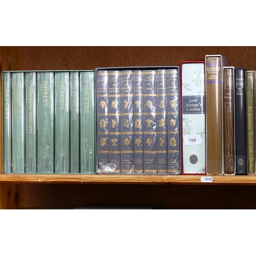 700 - A shelf of folio books, including Jane Austen, Charlotte Bronte etc