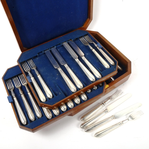 1013 - A canteen of silver plated dinner knives and forks for 18 people, with bead edge handles and engrave... 