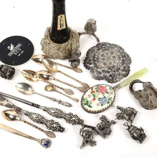 1014 - A silver-handled button hook and shoe horn, teaspoons, serpentine lighthouse etc