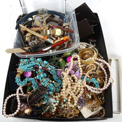 1023 - A large quantity of mixed costume jewellery, quartz wristwatches etc