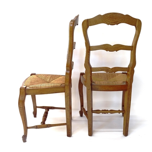 2002 - A set of 6 French rush-seat ladder-back dining chairs