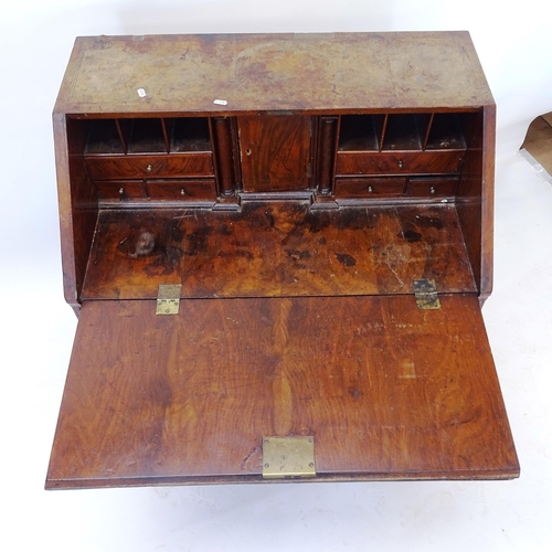 2004 - A Georgian mahogany and burr-walnut veneered bureau, the fall-front revealing a fitted interior, wit... 