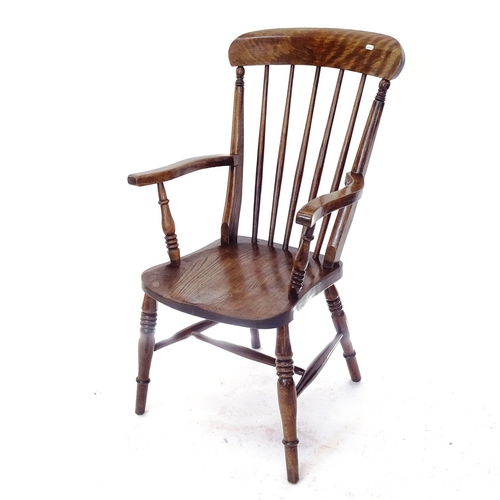 2007 - A Victorian and oak elm seated Windsor kitchen armchair