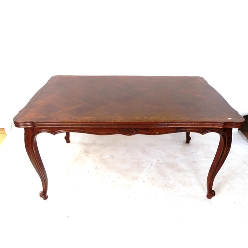 2031 - A large French oak parquetry-topped draw leaf dining table, on cabriole legs, L150cm extending to 25... 