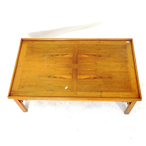 2035 - A modern yew wood coffee table, L107cm, H41cm, D63cm