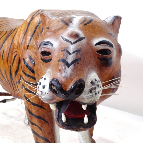 2049 - A leather-covered tiger (life-size), L125cm