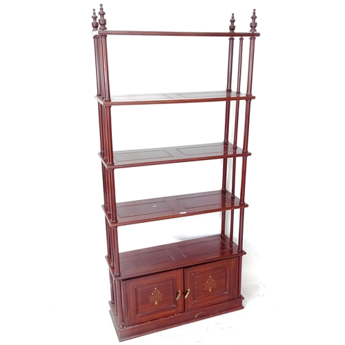 2054 - An Oriental hardwood 5-tier open bookcase, with brass inlaid cupboard doors (A/F), W91cm, H200cm, D3... 