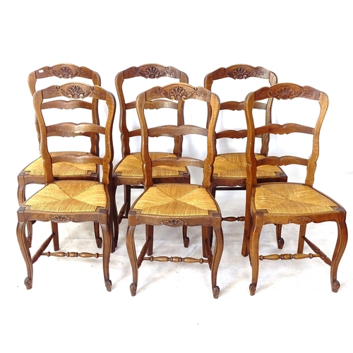 2063 - A set of 6 French carved oak ladder-back rush-seated dining chairs