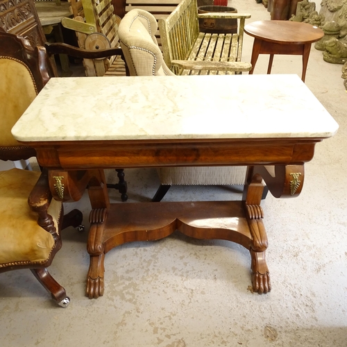 2798 - A 19th century mahogany marble-topped console table, with ogee-shaped frieze drawer, shaped end supp... 