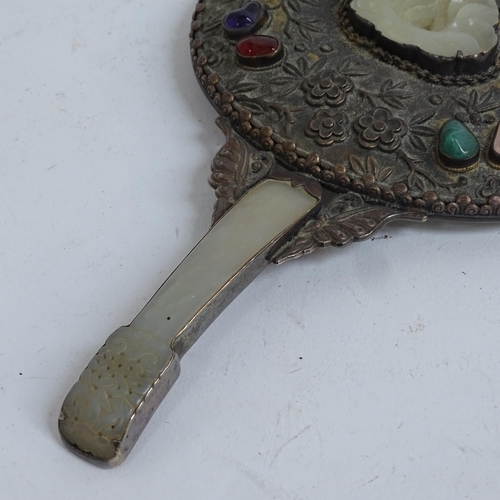 137 - A Chinese silver jade and hardstone dressing table hand mirror, with engraved and relief embossed bl... 