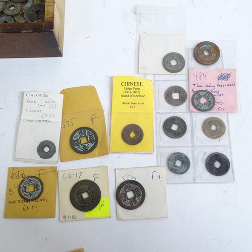 156 - A quantity of Chinese tokens and coins