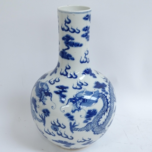 199 - A large Chinese blue and white 'Dragon' vase, height 34cm