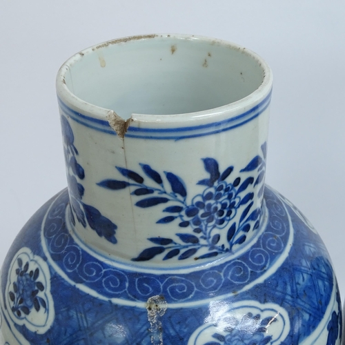 214 - A pair of Chinese blue and white 'Dragon' jars, height 37cm, and 1 lid (both chipped and cracked)