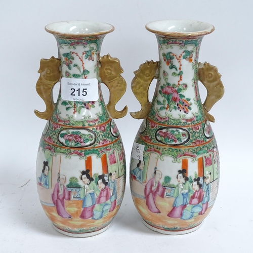 215 - A pair of Chinese Canton famille rose vases, hand painted and enamelled courtyard and bird decoratio... 