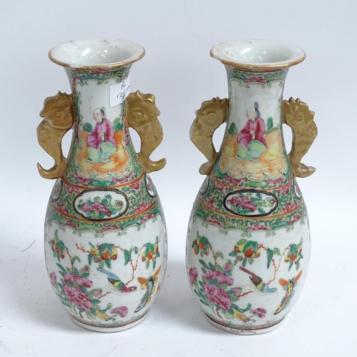 215 - A pair of Chinese Canton famille rose vases, hand painted and enamelled courtyard and bird decoratio... 