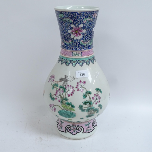 336 - A large Chinese famille rose baluster vase, peacock and chrysanthemum decoration, 6 character mark o... 