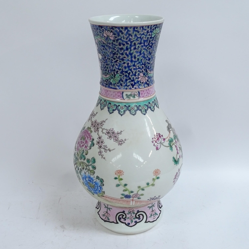 336 - A large Chinese famille rose baluster vase, peacock and chrysanthemum decoration, 6 character mark o... 