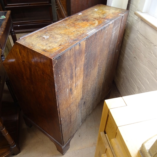 2004 - A Georgian mahogany and burr-walnut veneered bureau, the fall-front revealing a fitted interior, wit... 