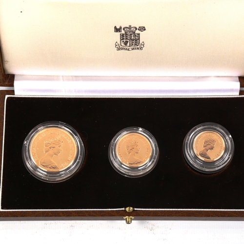 102 - Royal Mint 1983 United Kingdom gold proof three coin collection, comprising two pound, sovereign and... 