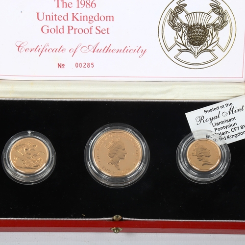 104 - Royal Mint 1986 United Kingdom gold proof three coin collection, comprising two pound, sovereign and... 