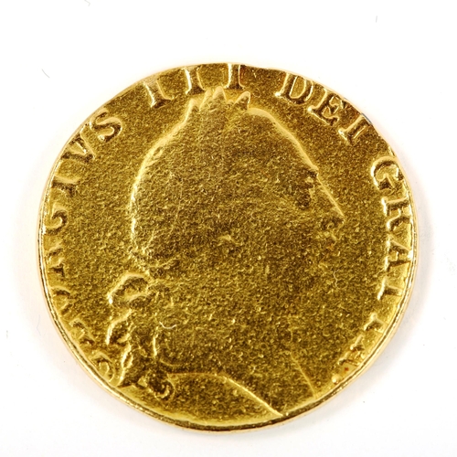 129 - A George III 1788 gold spade guinea coin, 8.1g