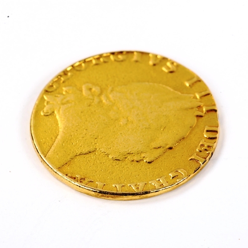 129 - A George III 1788 gold spade guinea coin, 8.1g