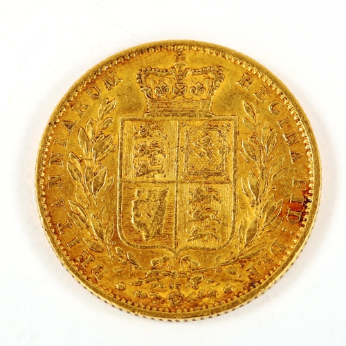 136 - A Victoria 1864 gold full sovereign coin, die no. 35, 7.9g