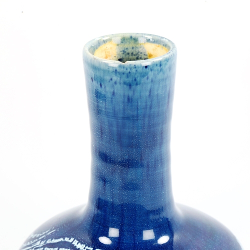 1003 - An art pottery dimple vase by Christopher Dresser for Linthorpe, makers stamp to base, height 23cm