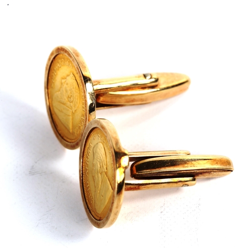 176 - A pair of South African one tenth ounce fine gold Krugerrand coin cufflinks, in 9ct gold mounts, 15.... 