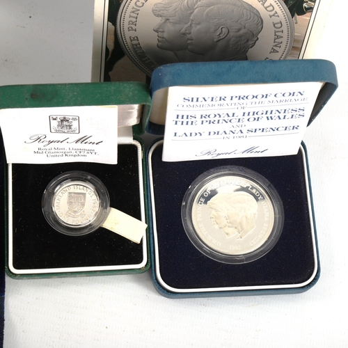 180 - A group of silver proof coins, including 1986 Royal Mint's 1,100 Years silver medal