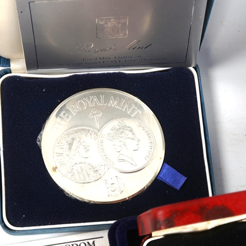 180 - A group of silver proof coins, including 1986 Royal Mint's 1,100 Years silver medal