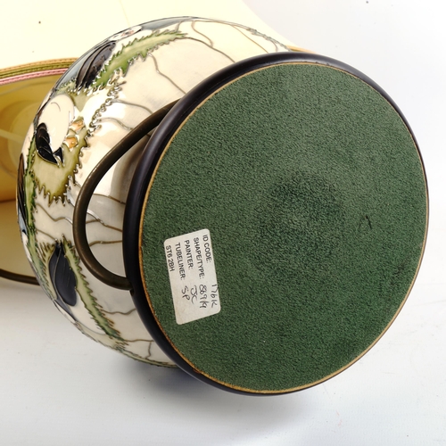 1047 - MOORCROFT POTTERY - a Puffin pattern table lamp and shade, height including shade 58cm