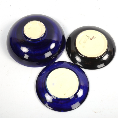 1048 - MOORCROFT POTTERY - a Magnolia design bowl, diameter 14cm, and 2 other small Moorcroft Potter pin di... 