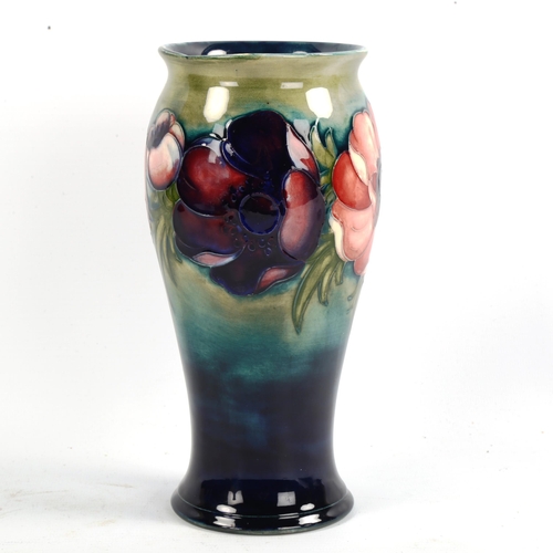 1049 - MOORCROFT POTTERY - a Poppy design vase, painted signature, height 20cm
