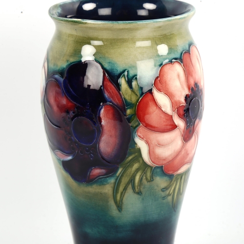 1049 - MOORCROFT POTTERY - a Poppy design vase, painted signature, height 20cm