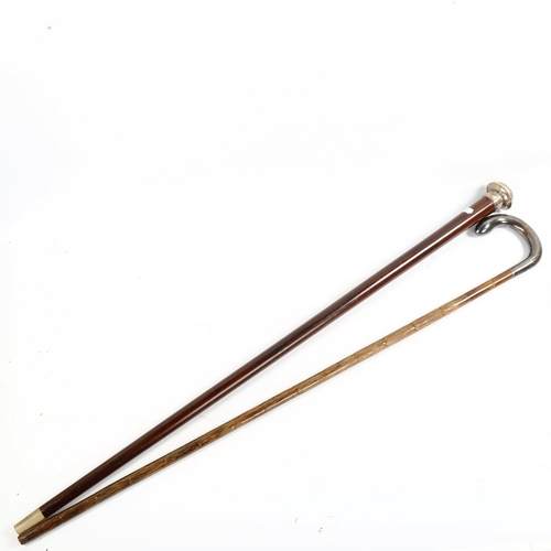 1054 - 2 hallmarked silver-topped walking canes
