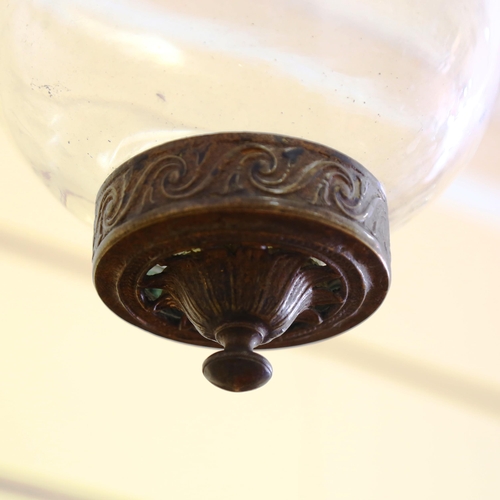 1056 - A glass and brass hanging light bowl with dove suspension, height approx 70cm