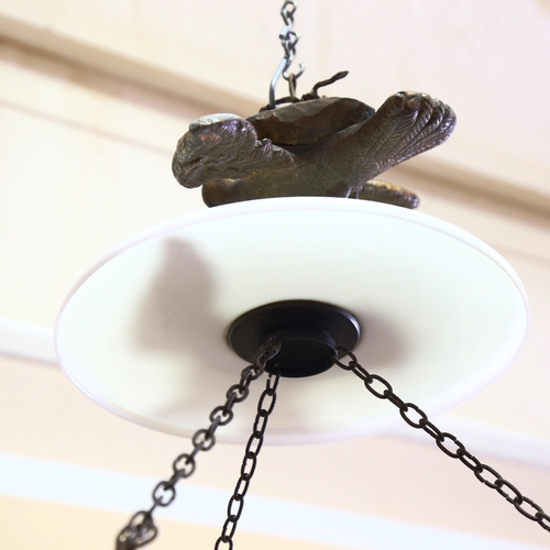 1056 - A glass and brass hanging light bowl with dove suspension, height approx 70cm