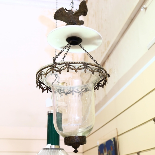 1056 - A glass and brass hanging light bowl with dove suspension, height approx 70cm