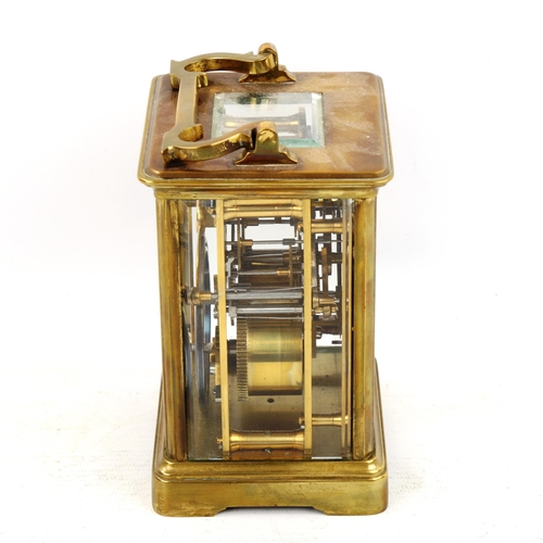 60 - A French brass-cased carriage clock, white enamel dial with Roman numeral hour markers and movement ... 