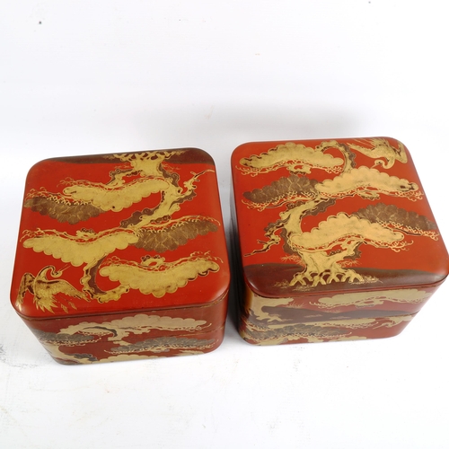 1061 - A pair of Japanese gilded red lacquer square 2-section boxes and covers, with heron designs, 21cm ac... 