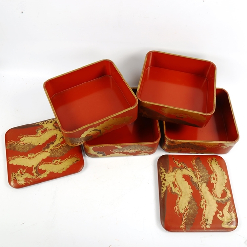 1061 - A pair of Japanese gilded red lacquer square 2-section boxes and covers, with heron designs, 21cm ac... 