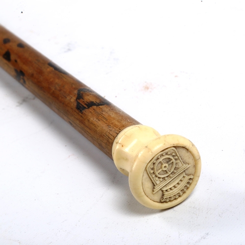 1070 - An 18th/19th century ivory-handled walking cane, with seal top
