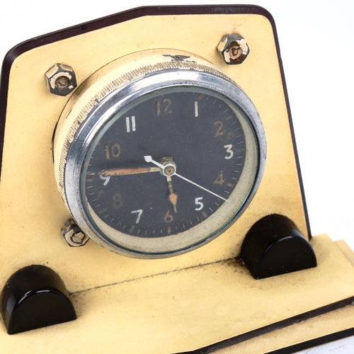 71 - A military issue tank dashboard clock, in Art Deco stepped case, ref. 6A/1002, Mk IIA, black dial wi... 