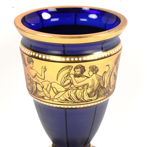 1082 - A Venetian dark blue glass vase with gilded Classical frieze, height 15cm, diameter 10cm