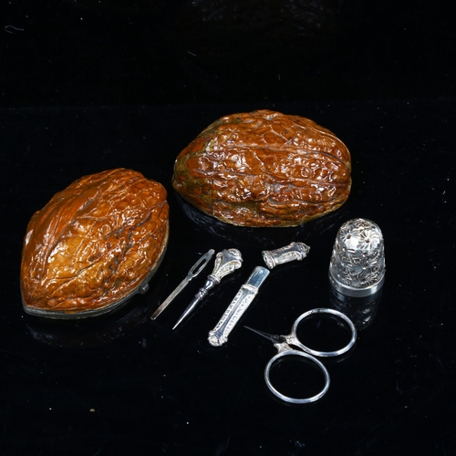 1090 - A 19th century walnut sewing etui, original fitted interior including scissors, length 5cm