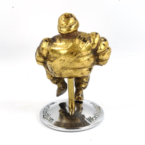 1093 - A Michelin brass car mascot, on Worthington chrome plate stand, height 11cm