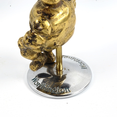 1093 - A Michelin brass car mascot, on Worthington chrome plate stand, height 11cm