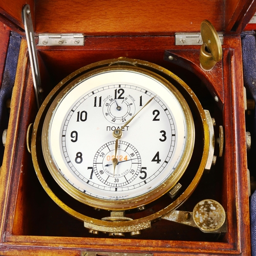 80 - A Russian ship's marine chronometer, by Polet, serial no. 02124, in gimballed frame, with display ca... 