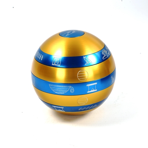 1096 - An Isis puzzle ball in original wooden case, diameter 7cm